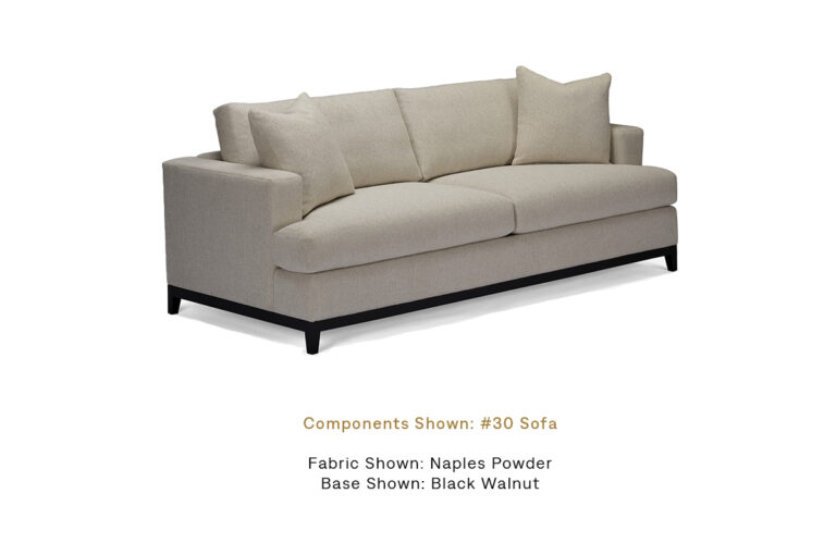 The Essentials Sofa with Black Walnut Leg finish by Burton James, upholstered in Naples Powder.